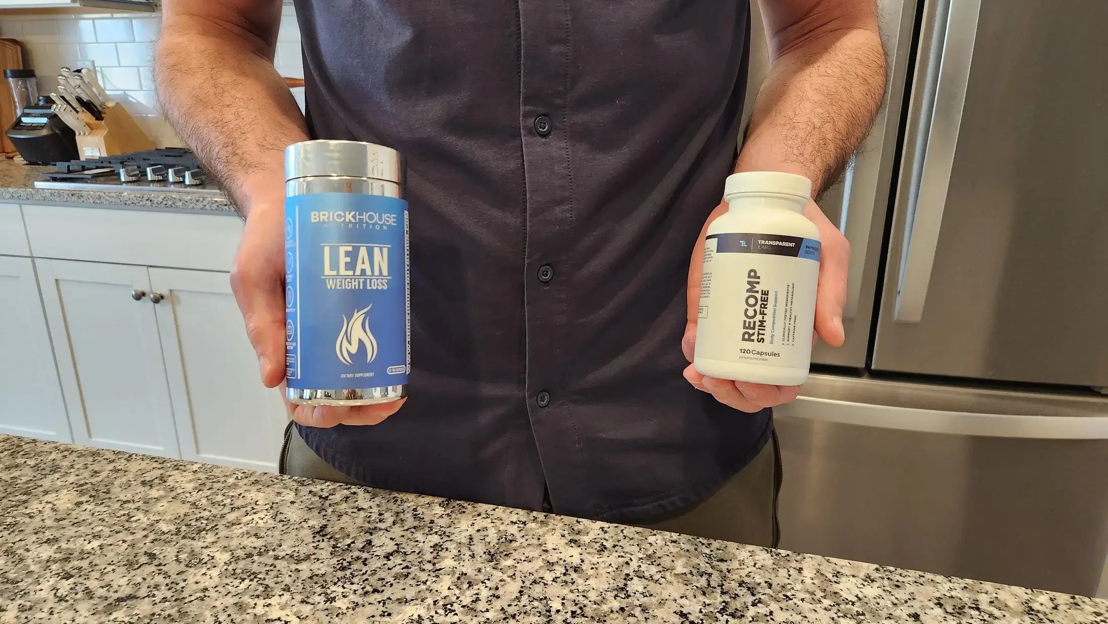 Certified Sports Nutrition Coach and Personal Trainer Pete Nastasi holds BrickHouse Nutrition Lean and Transparent Labs Recomp Stim-Free
