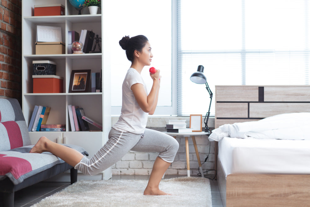 woman exercising at home