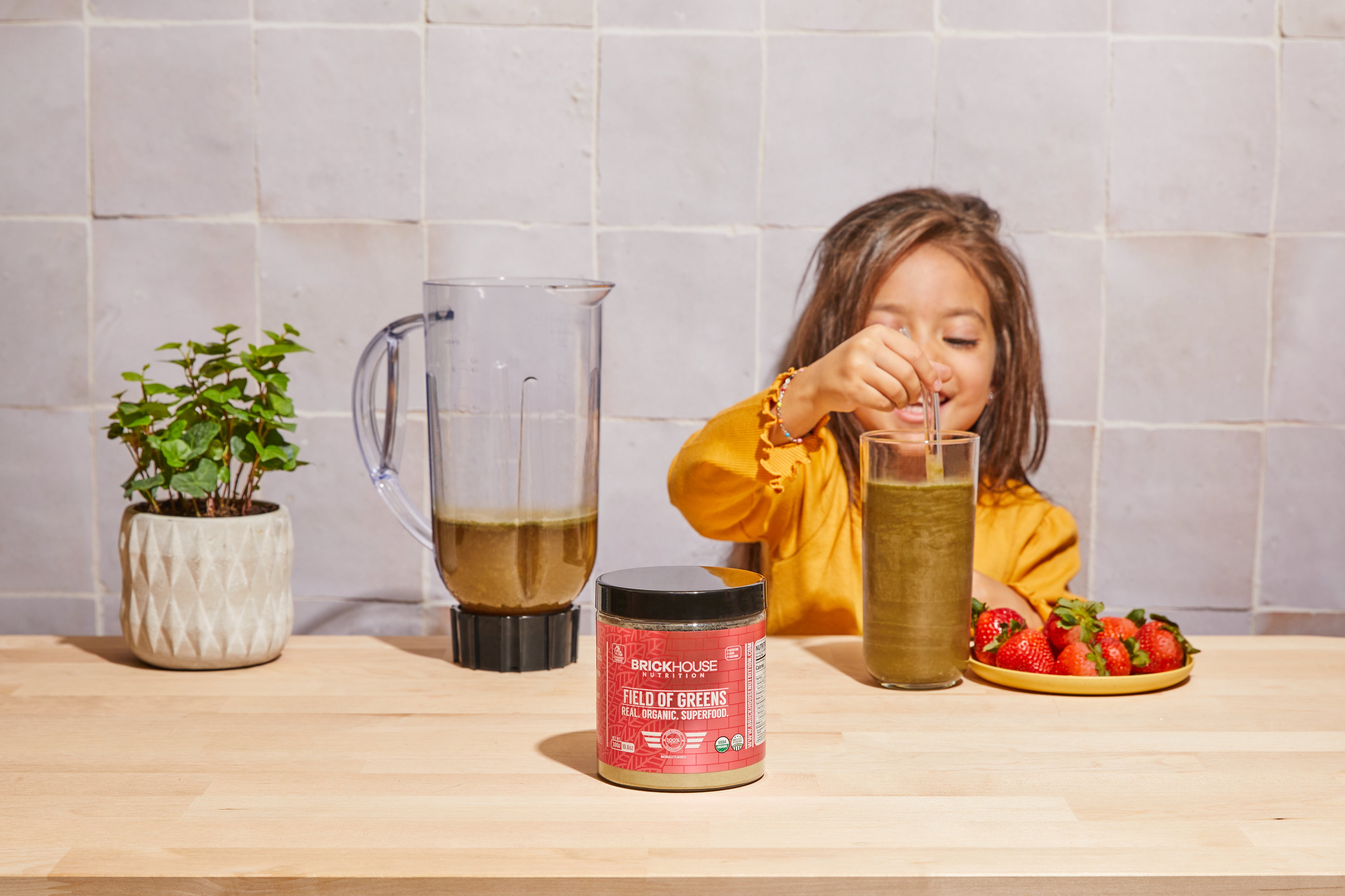 Field of Greens Strawberry Lemonade with child